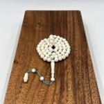 مسباح عظم جمل منقوش