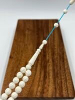 ⁦مسباح عظم جمل منقوش⁩ - الصورة ⁦3⁩