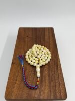 مسباح مستكه شبيه الكهرمان مشخط تايقر