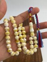 ⁦مسباح مستكه شبيه الكهرمان مشخط تايقر⁩ - الصورة ⁦2⁩