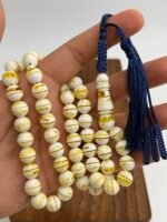 ⁦مسباح مستكه شبيه الكهرمان مشخط تايقر⁩ - الصورة ⁦2⁩