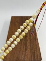 ⁦مسباح مستكه شبيه الكهرمان مشخط تايقر⁩ - الصورة ⁦3⁩