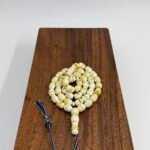 مسباح مستكه شبيه الكهرمان مشخط تايقر