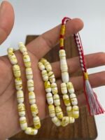 ⁦مسباح مستكه شبيه الكهرمان مشخط تايقر⁩ - الصورة ⁦2⁩