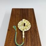 مسباح مستكه شبيه الكهرمان مشخط تايقر