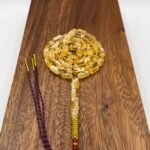 مسباح مستكه شبيه الكهرمان عسلي ملطخ