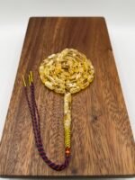 مسباح مستكه شبيه الكهرمان عسلي ملطخ