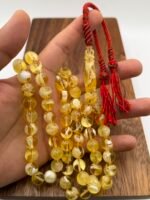 ⁦مسباح مستكه شبيه الكهرمان عسلي ملطخ⁩ - الصورة ⁦3⁩