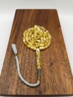 مسباح مستكه شبيه الكهرمان عسلي ملطخ