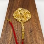 مسباح مستكه شبيه الكهرمان عسلي ملطخ