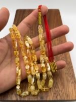 ⁦مسباح مستكه شبيه الكهرمان عسلي ملطخ⁩ - الصورة ⁦3⁩